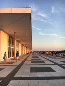 The rooftop terrace at The Kennedy Center is warmed by the golden rays of a setting sun
